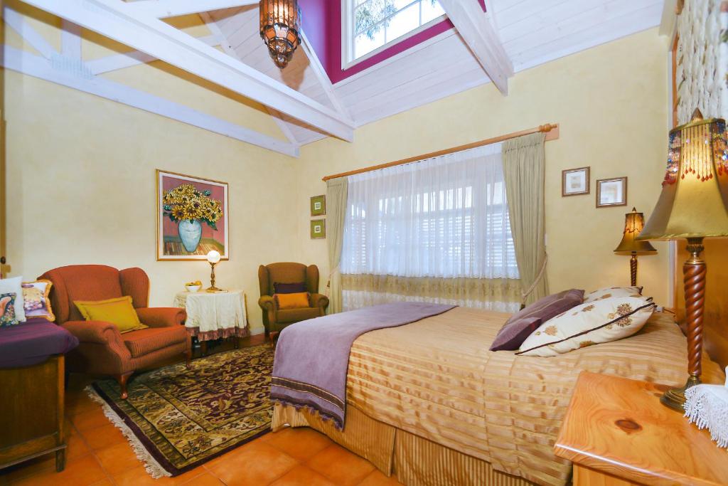 Postel nebo postele na pokoji v ubytování Ford House Bed & Breakfast