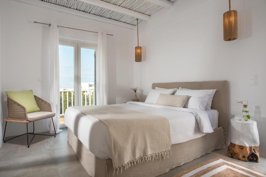 Postel nebo postele na pokoji v ubytování Delmar Apartments & Suites Milos - Delmar Collection