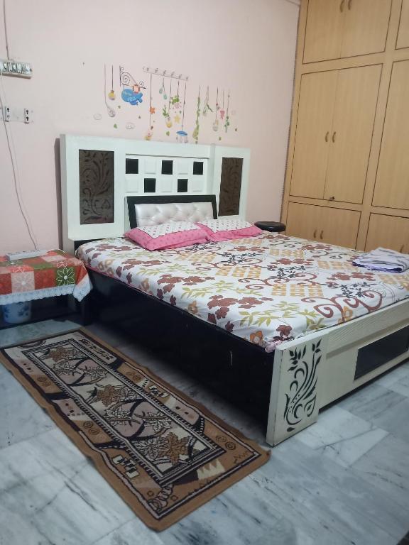 Postel nebo postele na pokoji v ubytování Sunita homestay