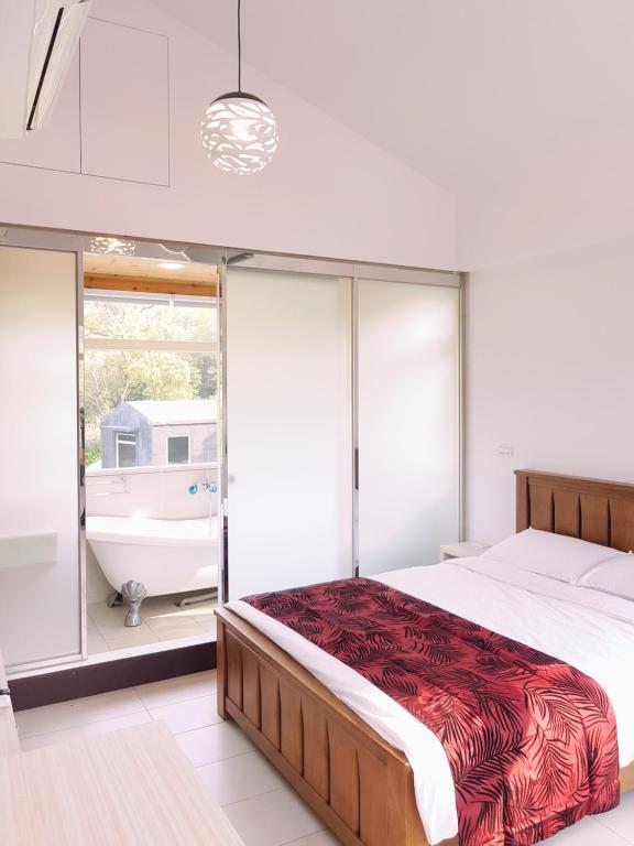 Postel nebo postele na pokoji v ubytování Moon Shine B&B