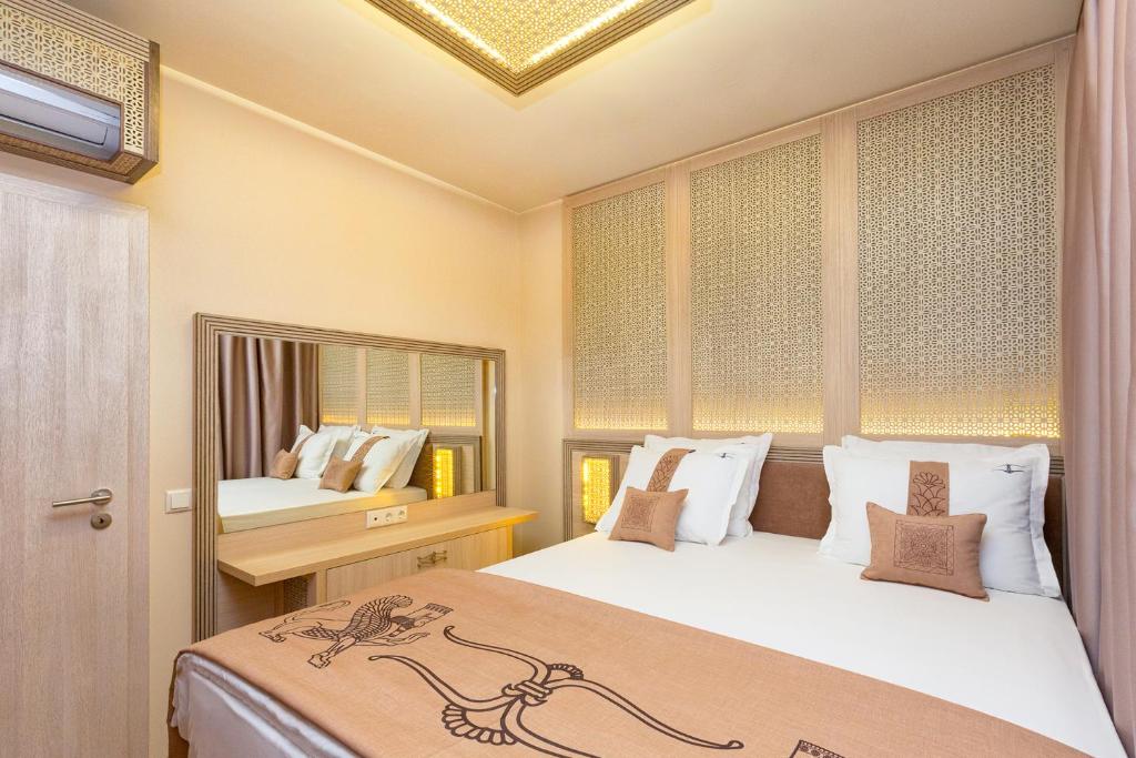 A bed or beds in a room at Argisht Partez Hotel ALL INCLUSIVE and beach