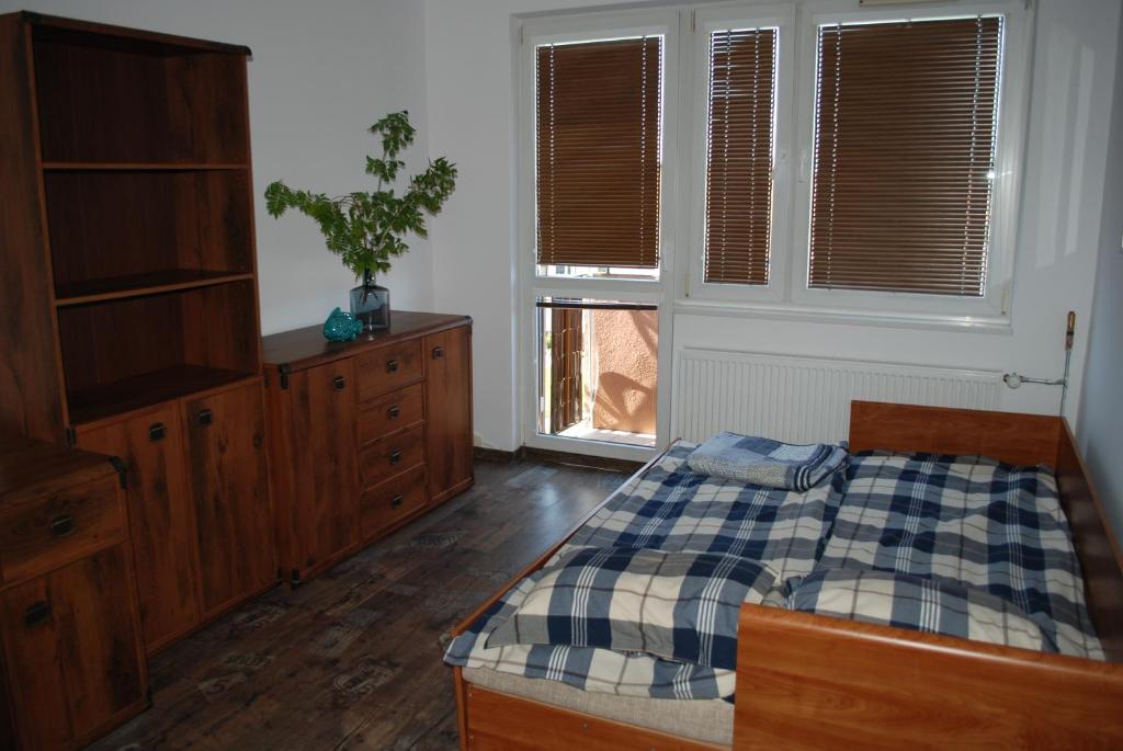Posteľ alebo postele v izbe v ubytovaní Apartament Morski