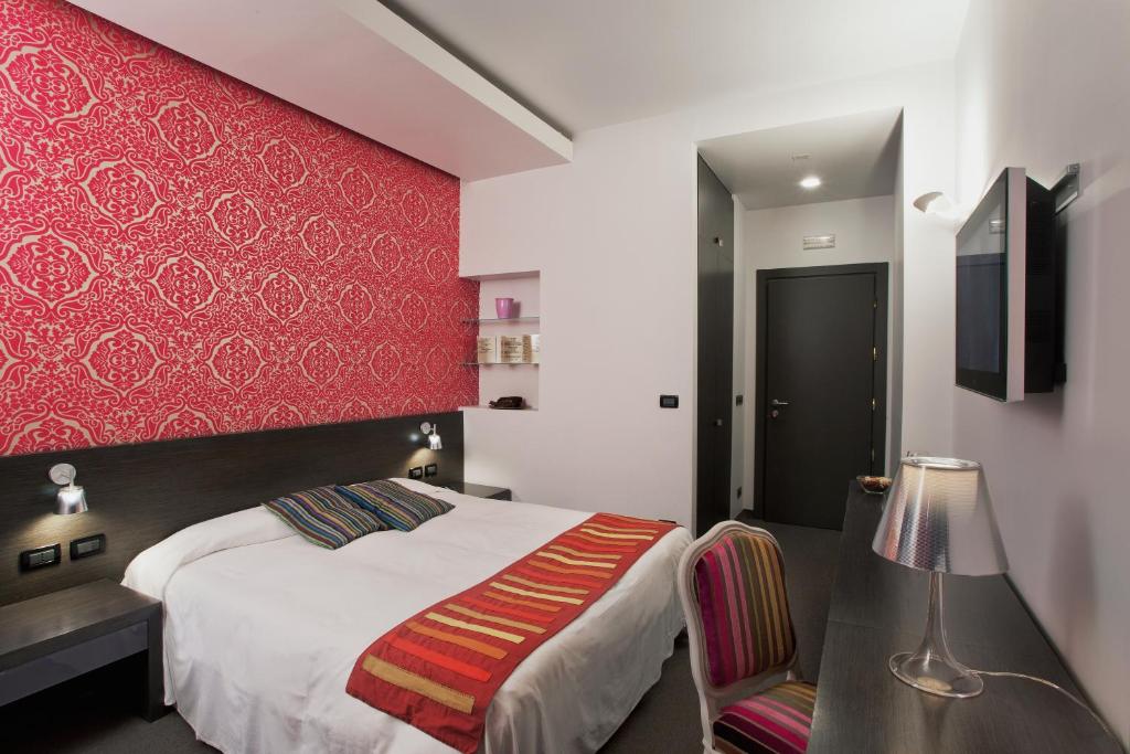Postel nebo postele na pokoji v ubytování MA Hotel