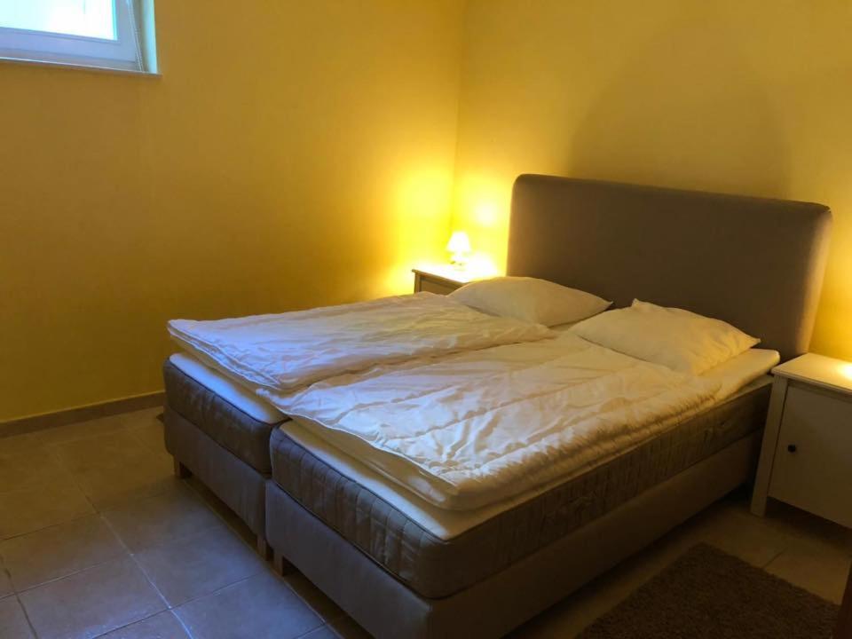 Posteľ alebo postele v izbe v ubytovaní Apartamenty Beata Wisełka