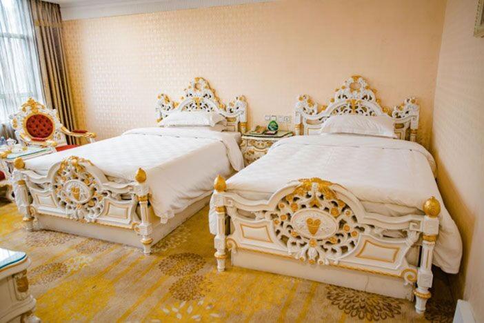 Postel nebo postele na pokoji v ubytování Nanyang King's Gate Hotel--Free Shuttle Service to Canton Fair
