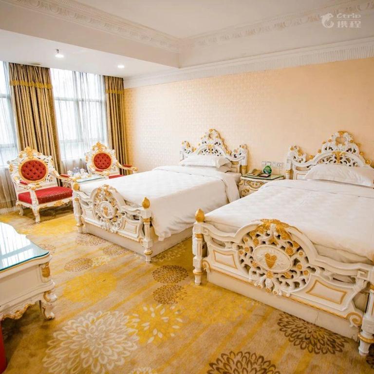 Postel nebo postele na pokoji v ubytování Nanyang King's Gate Hotel--Free Shuttle Service to Canton Fair