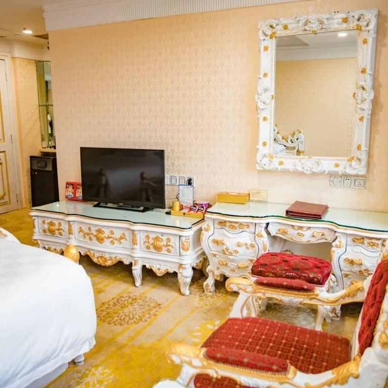 TV a/nebo společenská místnost v ubytování Nanyang King's Gate Hotel--Free Shuttle Service to Canton Fair