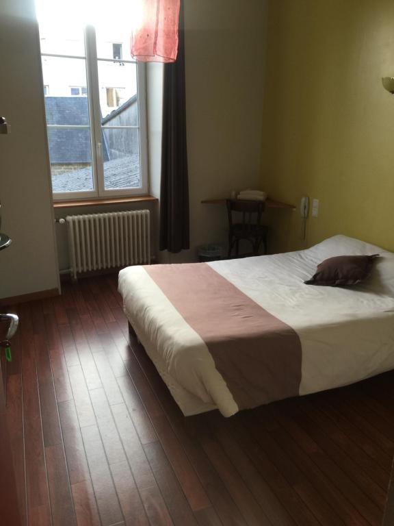 Postel nebo postele na pokoji v ubytování Au Père Tranquille