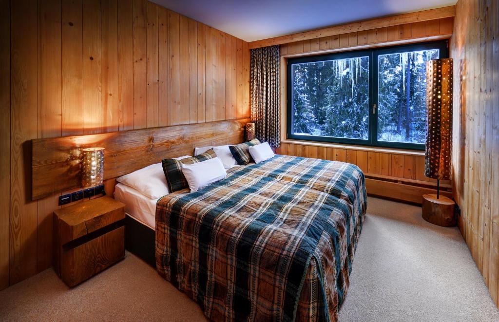 Postel nebo postele na pokoji v ubytování Hotel Tri Studničky - Adult friendly