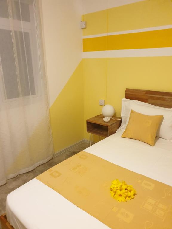 Postel nebo postele na pokoji v ubytování Casa Frangipani Mauritius