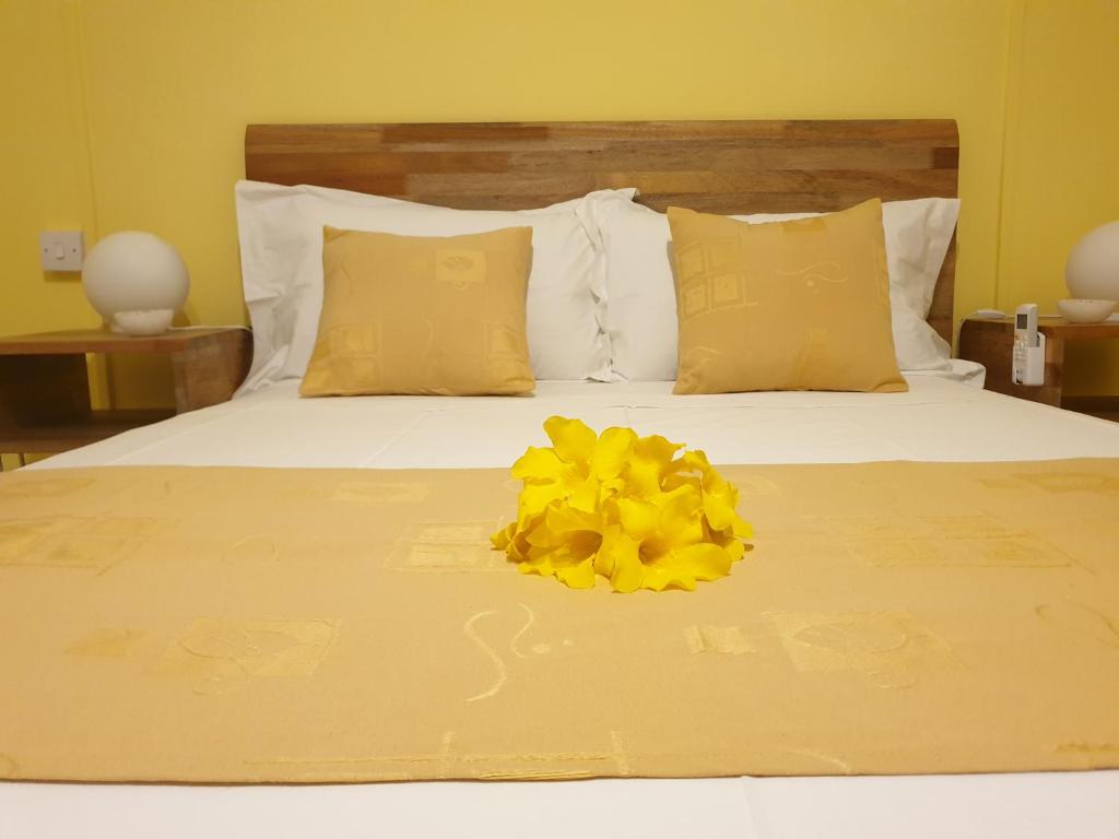 Postel nebo postele na pokoji v ubytování Casa Frangipani Mauritius