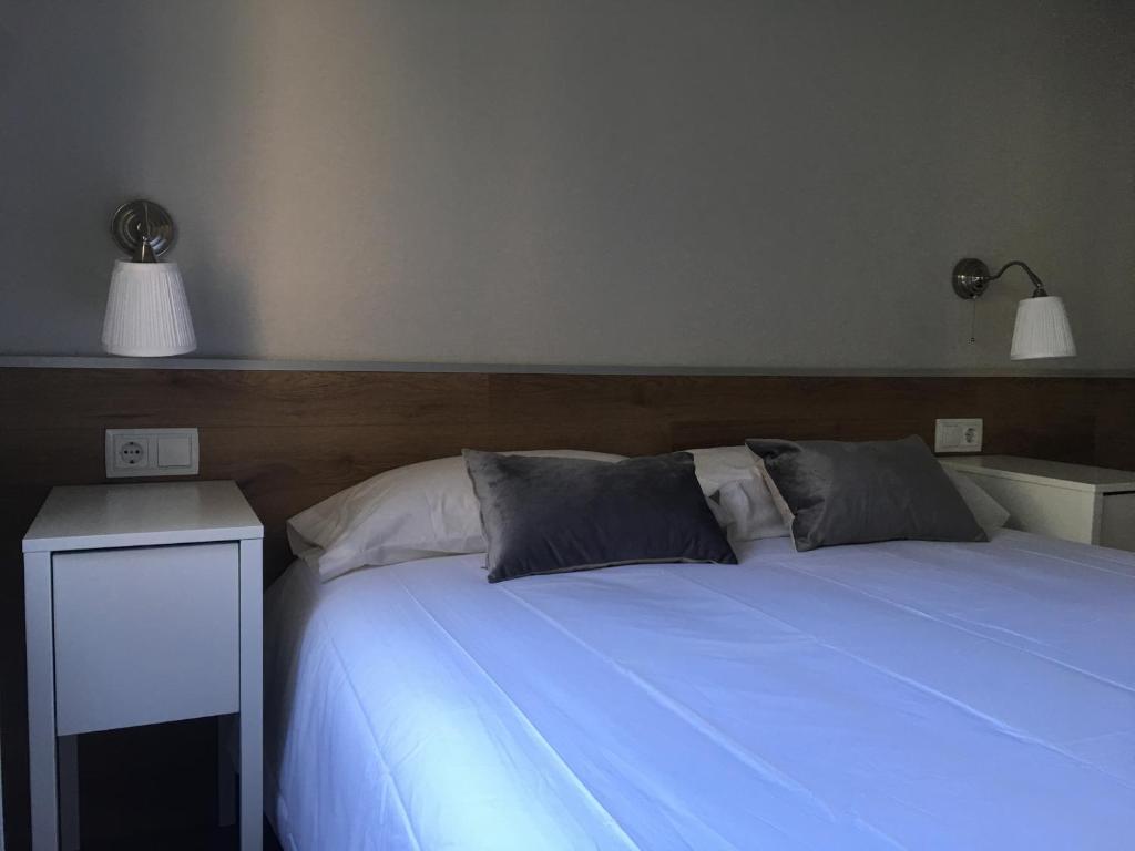 Postel nebo postele na pokoji v ubytování Apartaments La Pertusa 1r piso