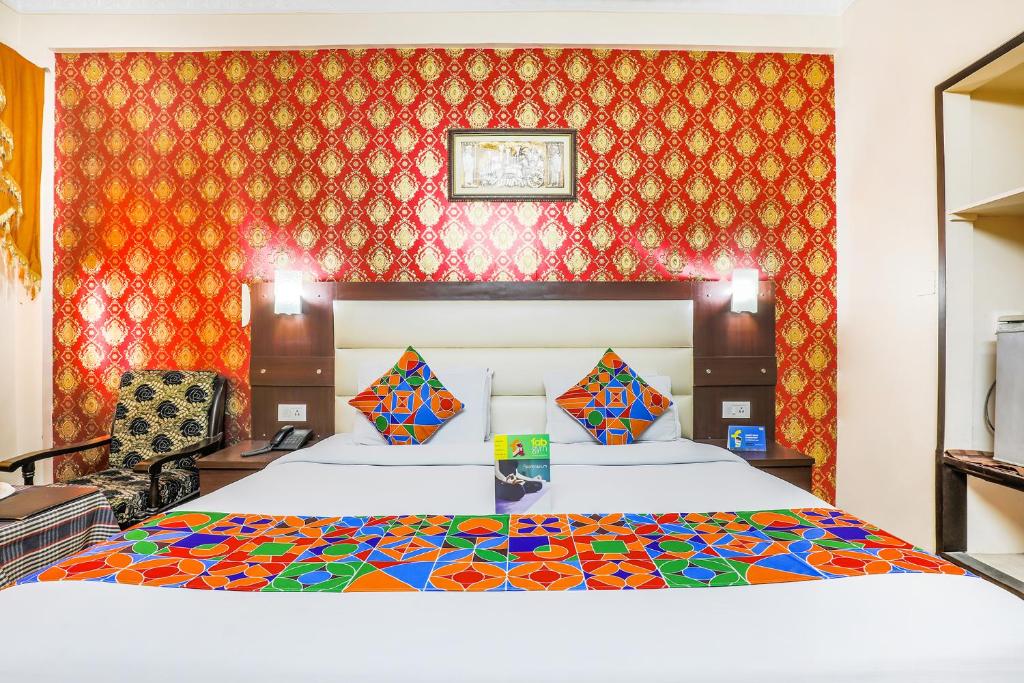 Postel nebo postele na pokoji v ubytování FabHotel Pramila Inn