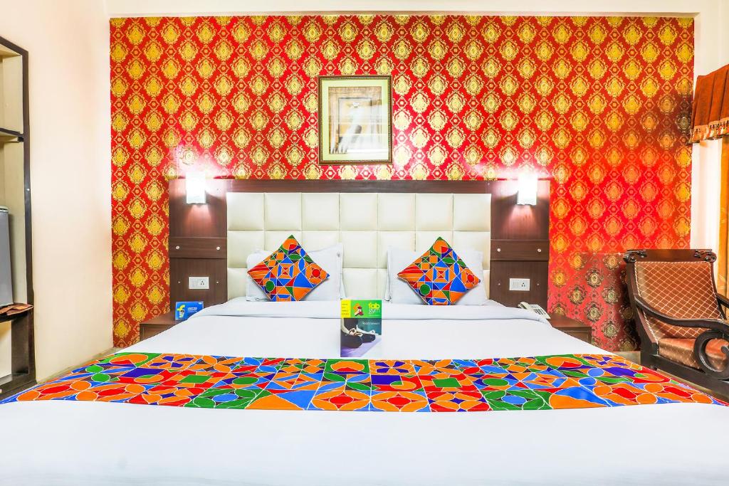 Postel nebo postele na pokoji v ubytování FabHotel Pramila Inn