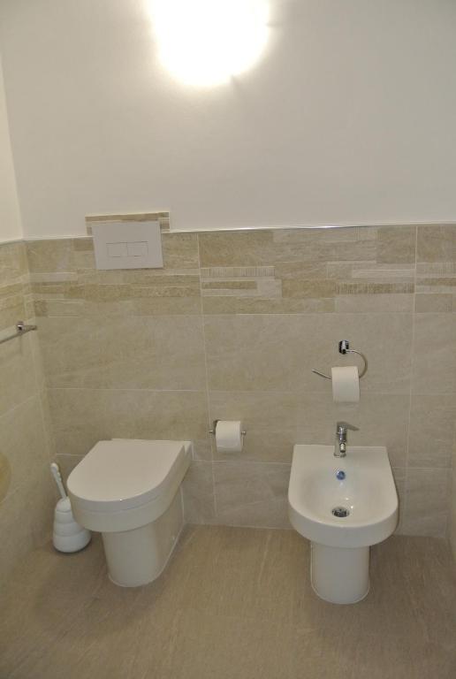 Łazienka w obiekcie Casa Vacanza La Pergola