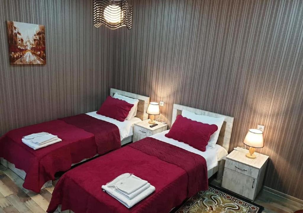 Postel nebo postele na pokoji v ubytování Hotel Dimasi
