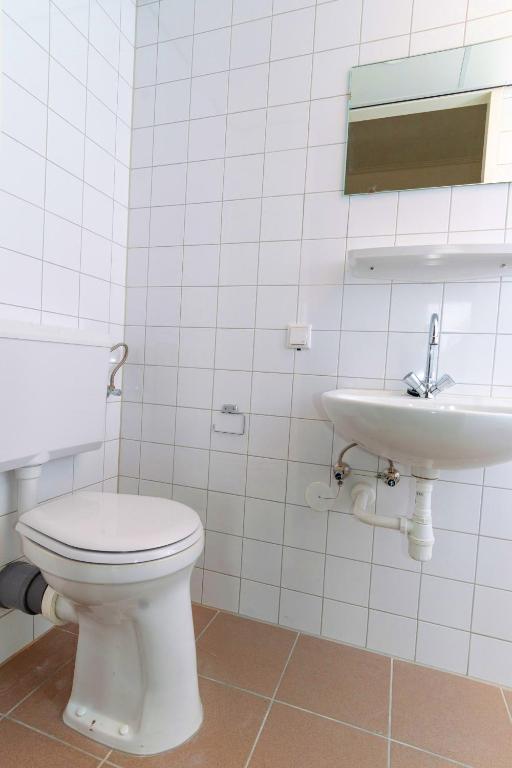 Un baño de Pink Flamingo Boutique Hostel