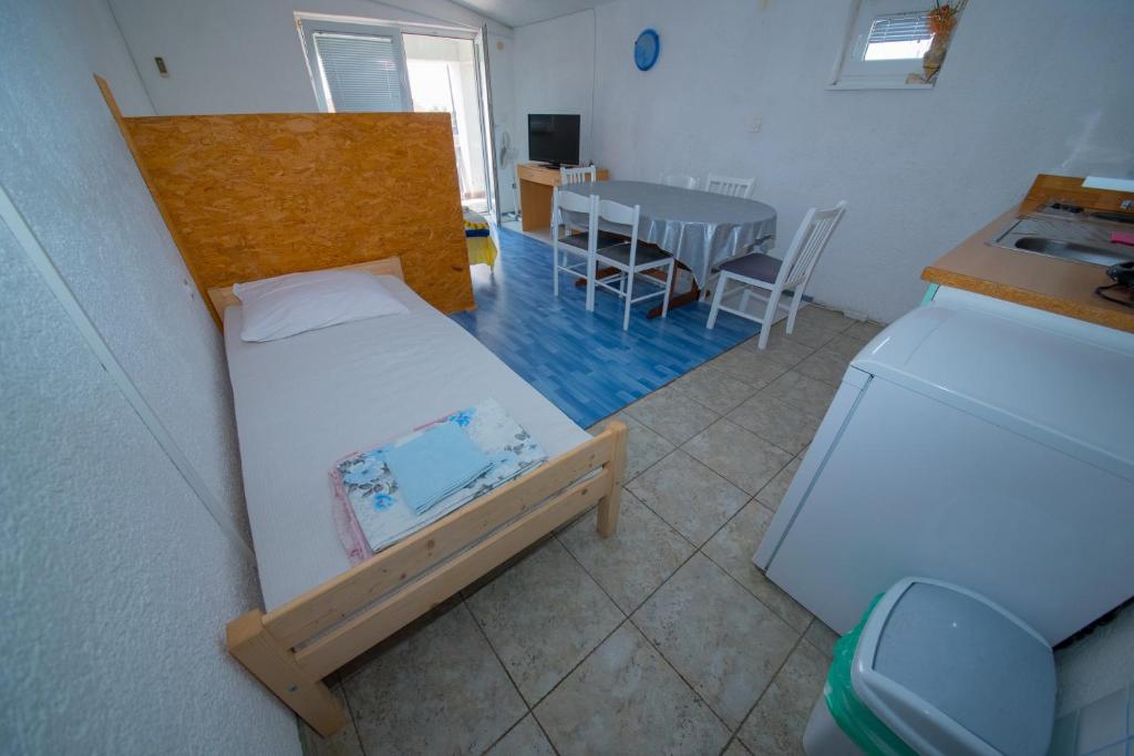 Posteľ alebo postele v izbe v ubytovaní Apartment Bušljeta
