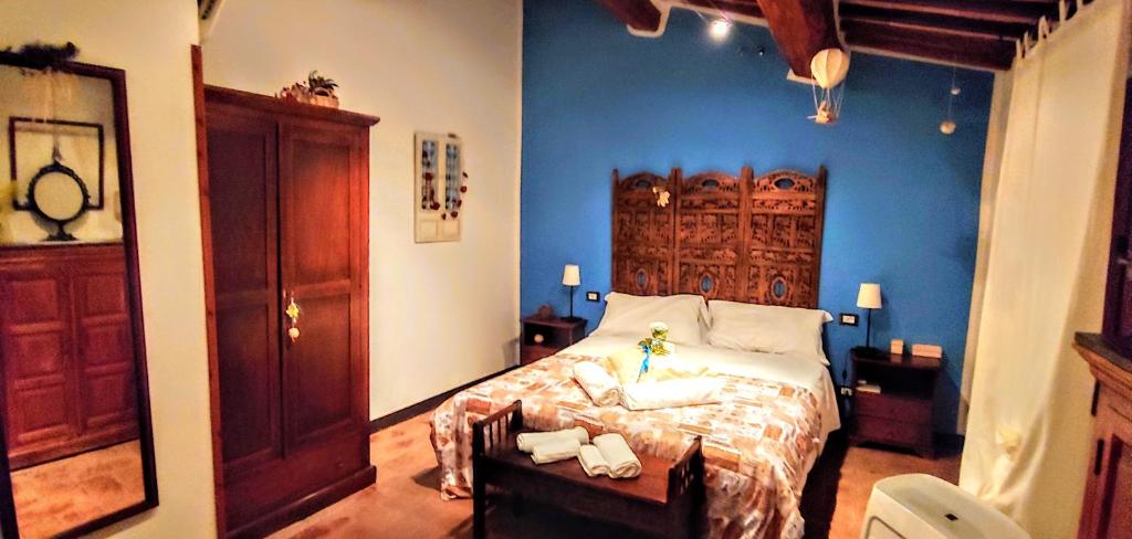 Postel nebo postele na pokoji v ubytování B&B Le Undici Lune