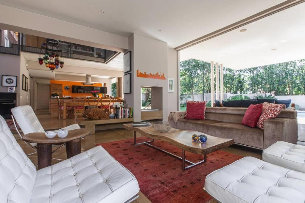 a living room with a couch and a table at Houghton Place in Johannesburg