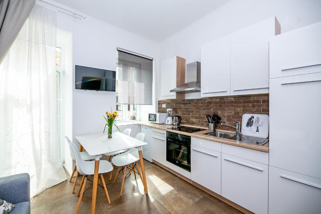 Kuchyňa alebo kuchynka v ubytovaní Apartments Bella Fiume