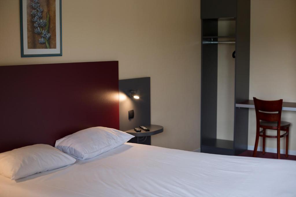 Postel nebo postele na pokoji v ubytování Mape hôtel
