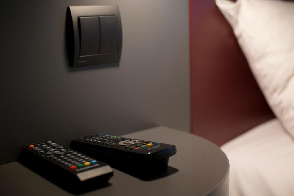 TV a/nebo společenská místnost v ubytování Mape hôtel