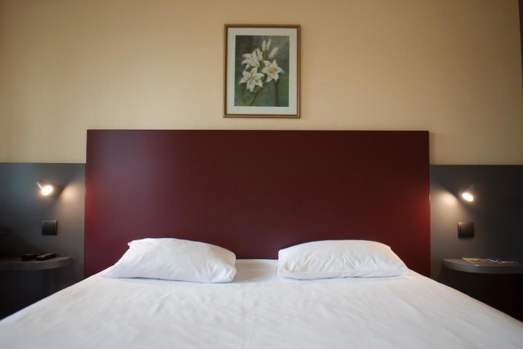 Postel nebo postele na pokoji v ubytování Mape hôtel