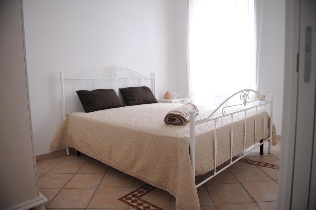 Posteľ alebo postele v izbe v ubytovaní Dimora Pace - ApulianStay Group