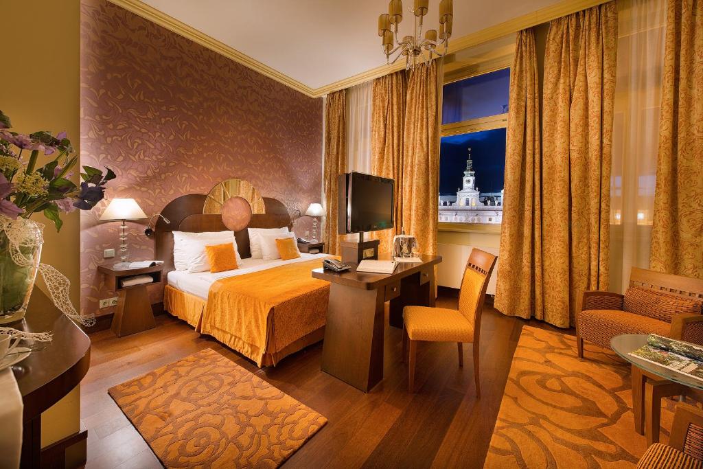 Voodi või voodid majutusasutuse Grandhotel Zvon toas