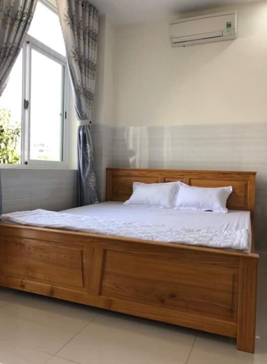 Postel nebo postele na pokoji v ubytování Nguyễn Kim Motel