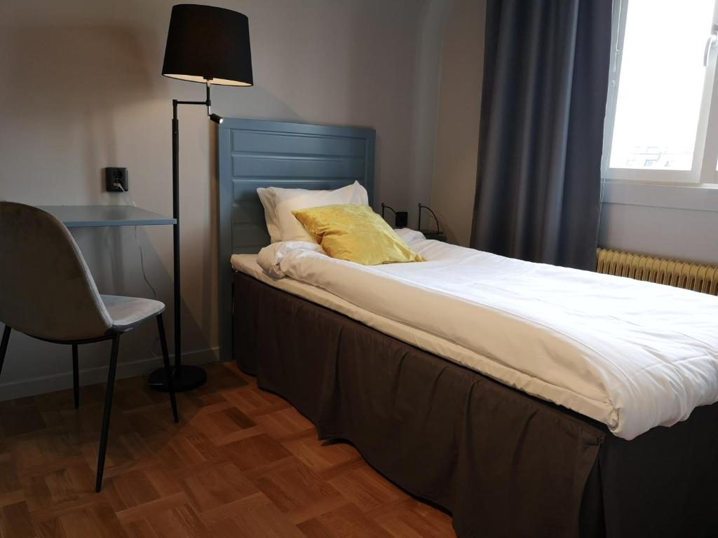 Postel nebo postele na pokoji v ubytování Hotell Apladalen i Värnamo