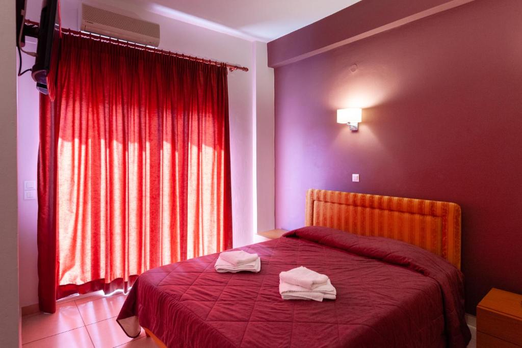 Postel nebo postele na pokoji v ubytování Hotel Apanema