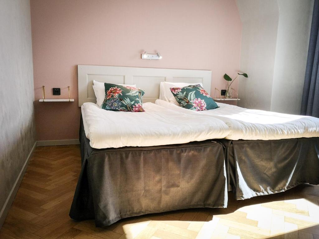 Postel nebo postele na pokoji v ubytování Hotell Apladalen i Värnamo
