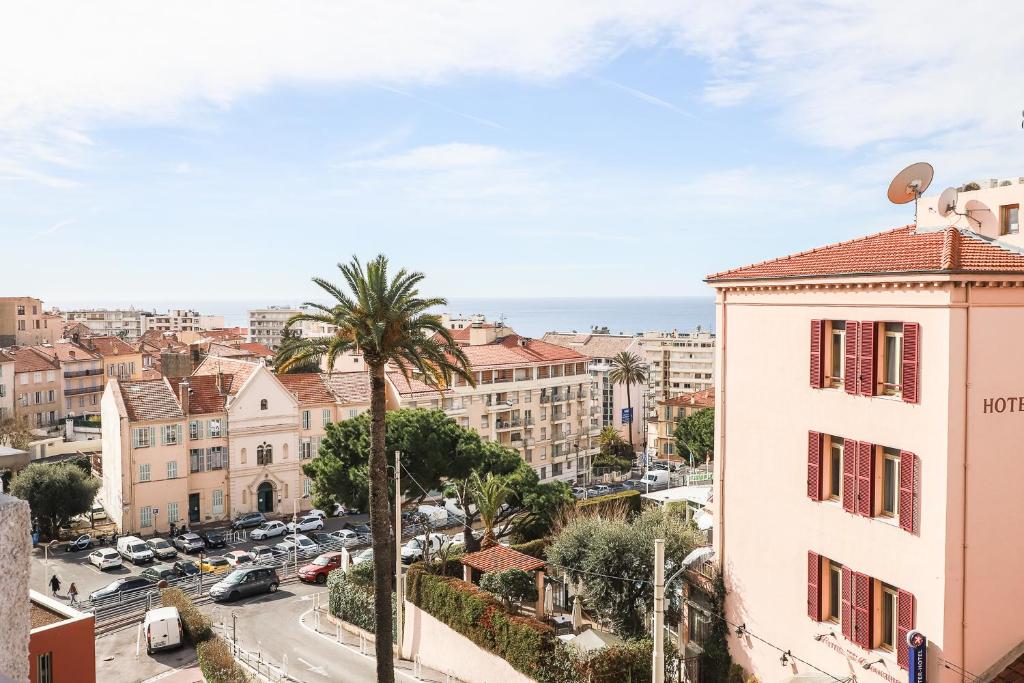 a view of a city from a building at ACCI Cannes Les Yuccas in Cannes