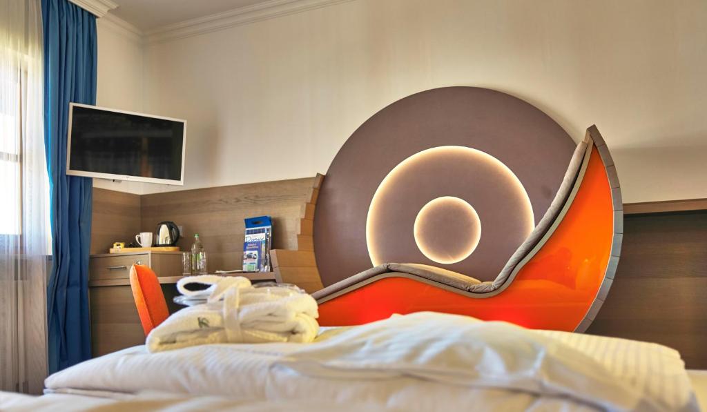 Postel nebo postele na pokoji v ubytování Hotel Lindenhof