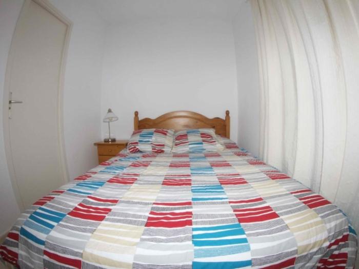 Łóżko lub łóżka w pokoju w obiekcie CHALET 84 con PISCINA PRIVADA