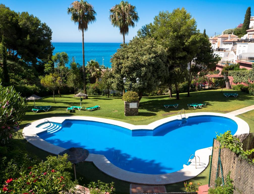 Výhľad na bazén v ubytovaní Ladera del Mar apartments alebo v jeho blízkosti