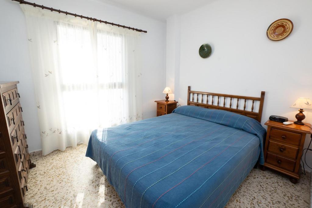 Postel nebo postele na pokoji v ubytování Mandarinos 35