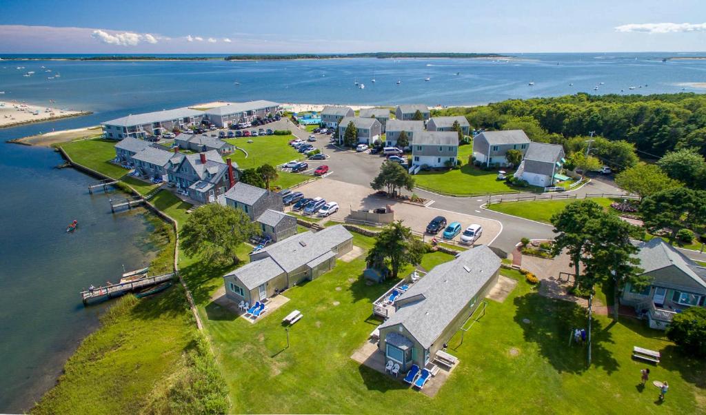 an aerial view of a village by the water at Green Harbor Resort in West Yarmouth