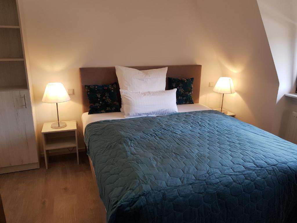 Postel nebo postele na pokoji v ubytování Oberwaldhaus