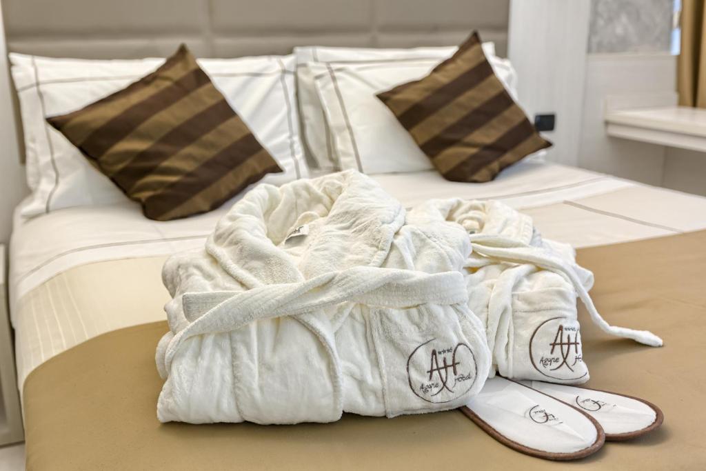 Postel nebo postele na pokoji v ubytování Agape Hotel AA Hotels