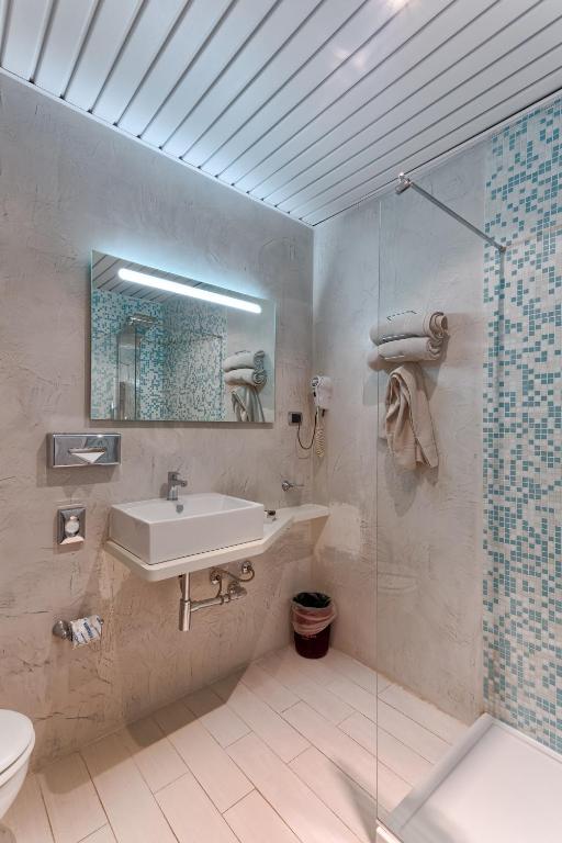 Koupelna v ubytování Agape Hotel AA Hotels