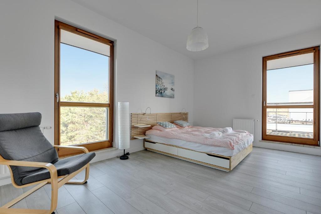 Posteľ alebo postele v izbe v ubytovaní Golden Bay by Nadmorski Dwór Apartments