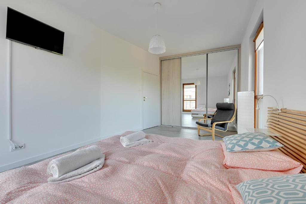 Televízia a/alebo spoločenská miestnosť v ubytovaní Golden Bay by Nadmorski Dwór Apartments