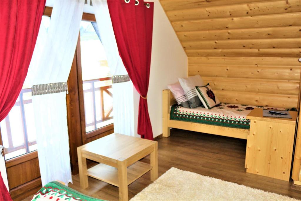 Posedenie v ubytovaní Szostak Apartament