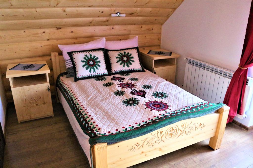 Posteľ alebo postele v izbe v ubytovaní Szostak Apartament
