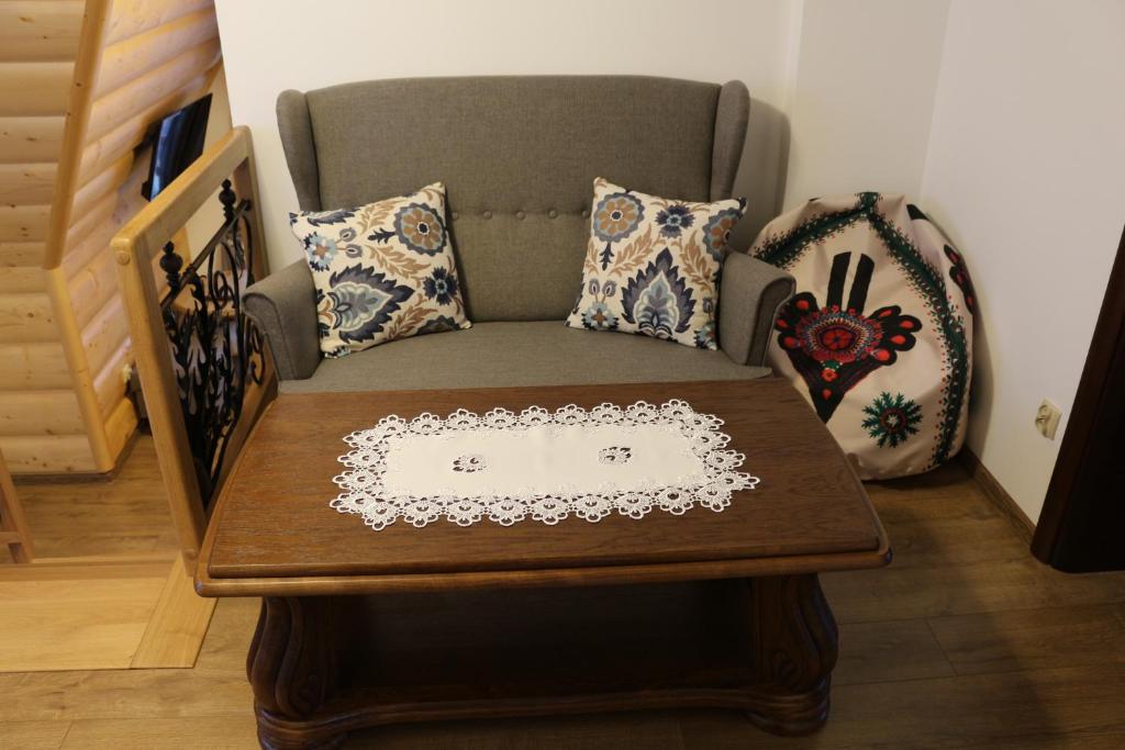 Posedenie v ubytovaní Szostak Apartament