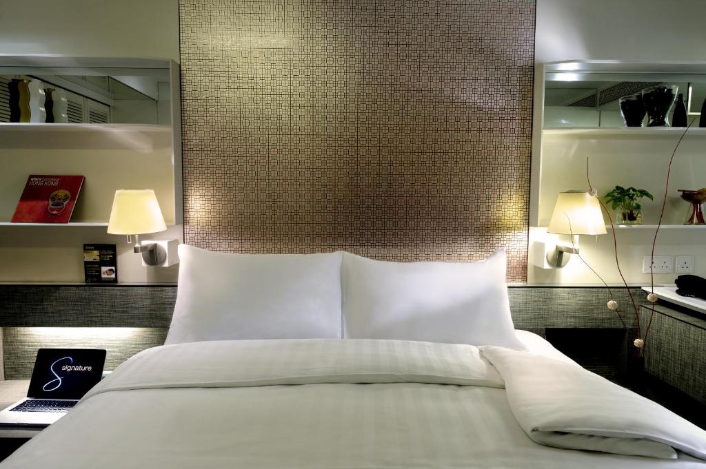 Letto o letti in una camera di Charterhouse Causeway Bay