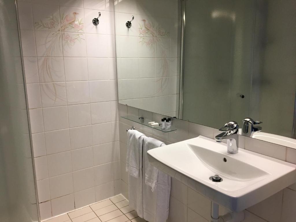 Koupelna v ubytování Hotel Småland